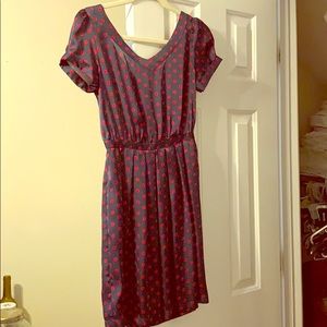 Adorable navy dress with red polka dots